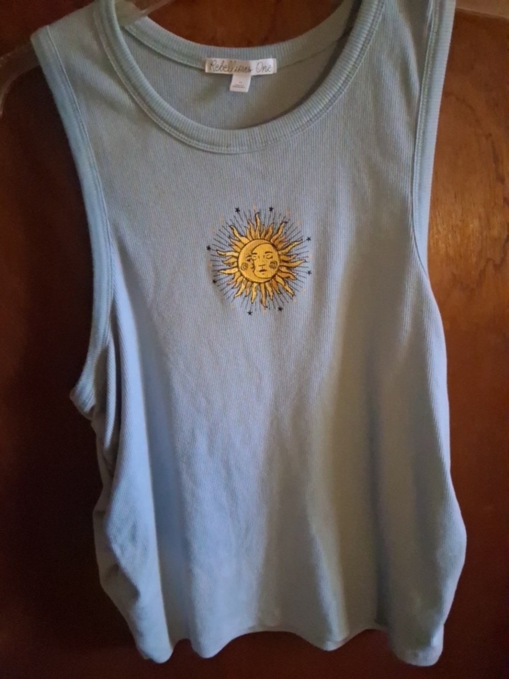 Rebellious One Pale Blue Ribbed Tank with Yellow Sun Motif